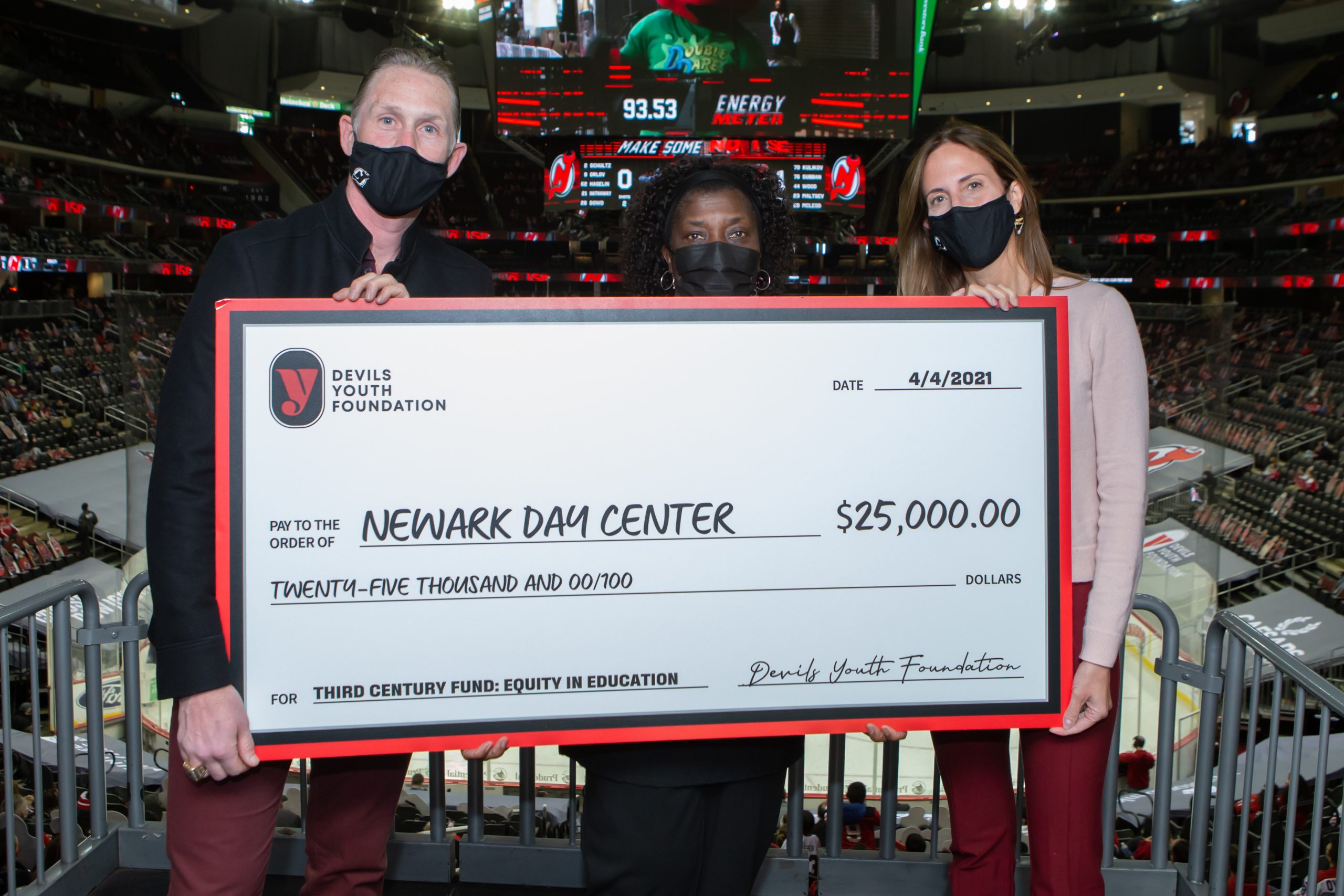 The Devils Youth Foundation donate 25,000 to the Newark Day Center as part of the night